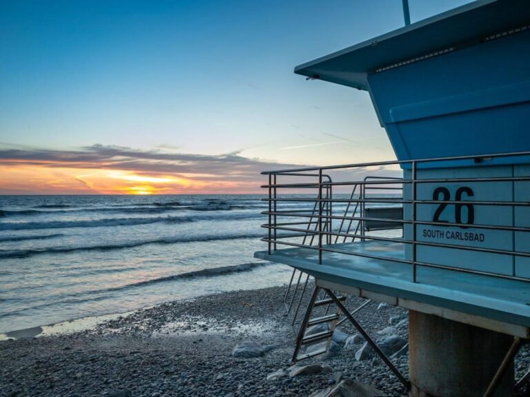 Carlsbad State Beach at sunset with lifeguard tower