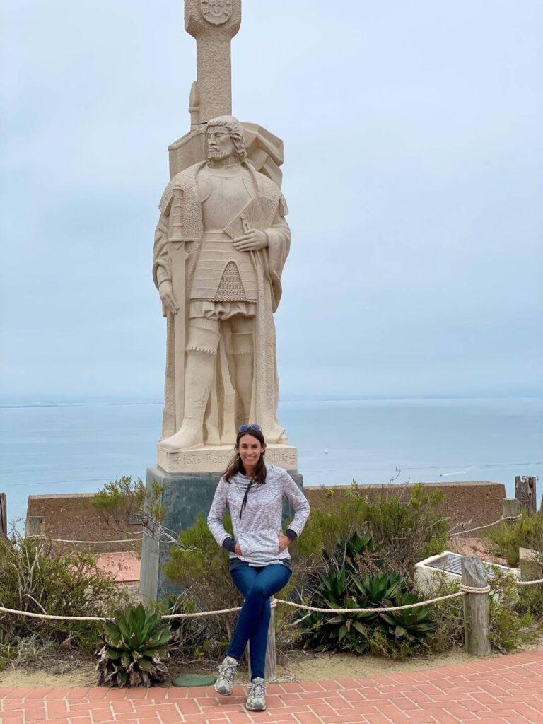 woman in front of Cabrillo National Monument for explorer Cabrillo