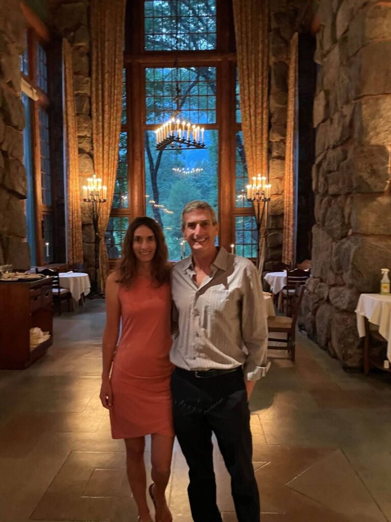 A couple in the The Ahwahnee Dining Room at night in Yosemite National Park