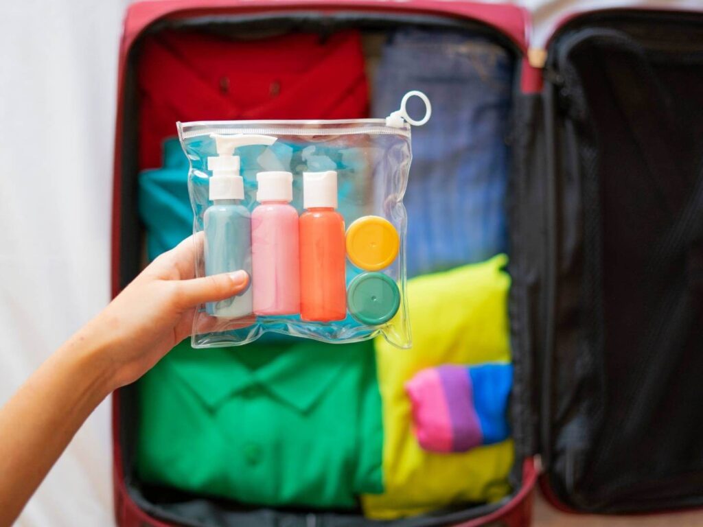 Tips for packing a suitcase like a professional including a clear bag for liquids