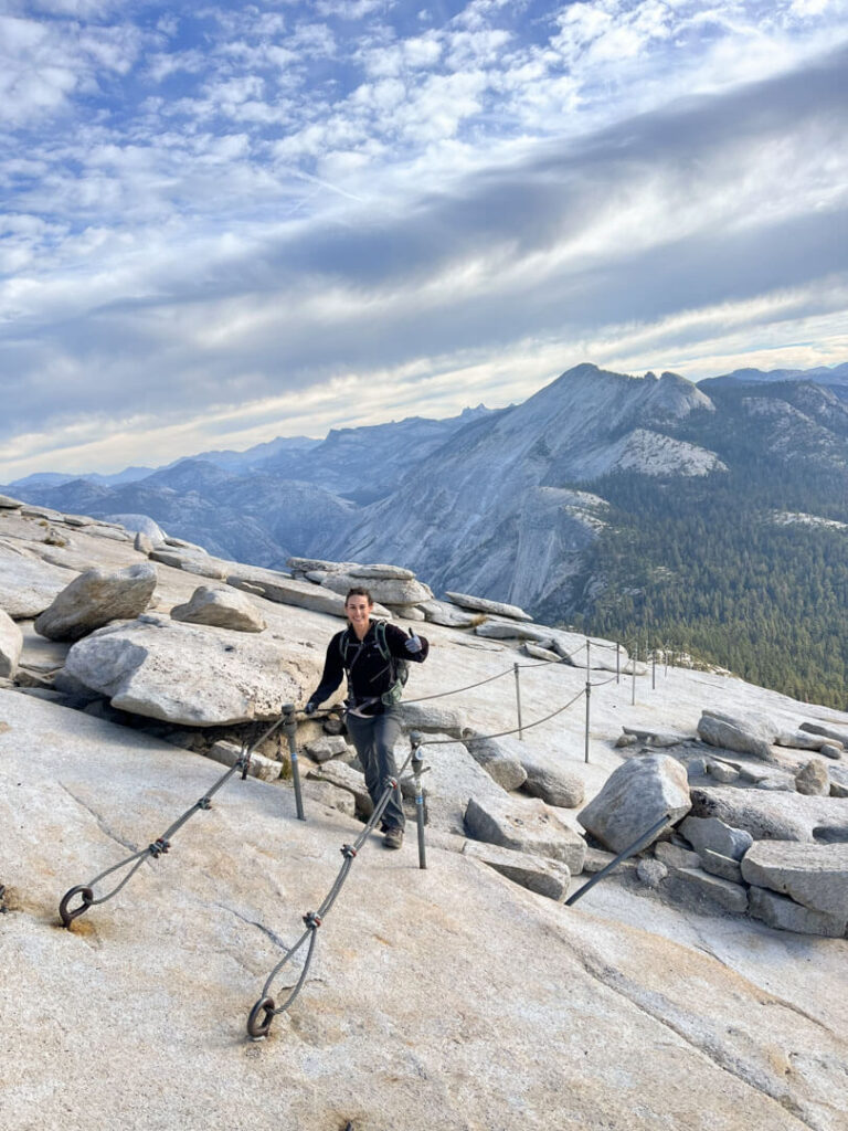 Woman at the Top of Half Dome cables