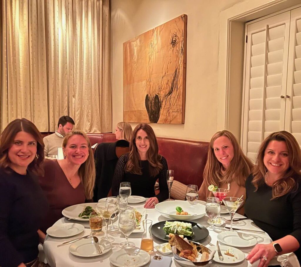 five women at dinner