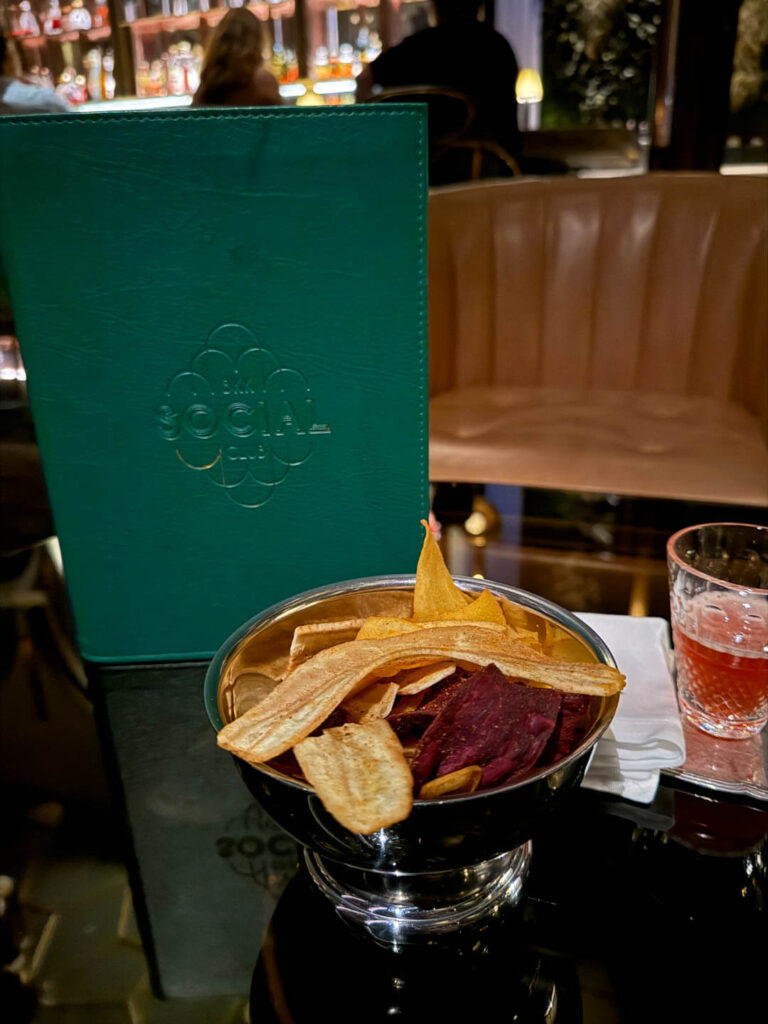 Bkk social club menu, bananna chips and a drink