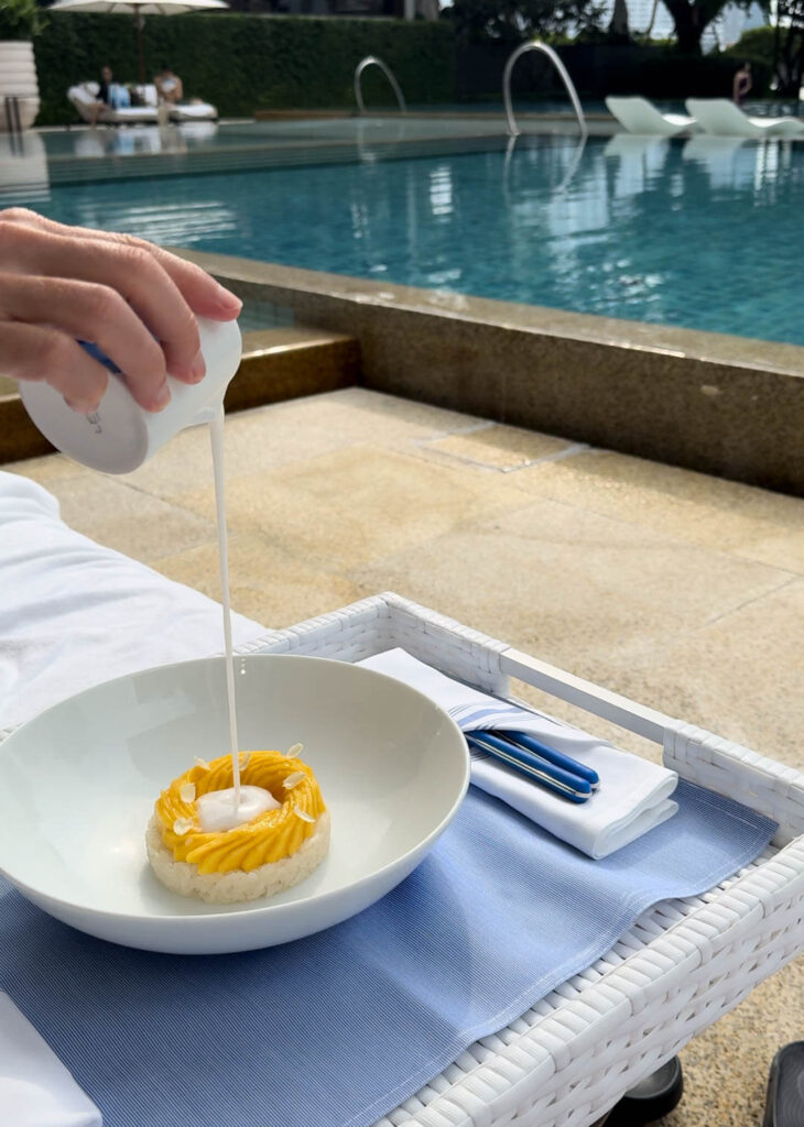 Mango sticky rice by the pool