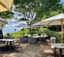 tables and lounge area at El Surf Club restaurant in Punta Mita