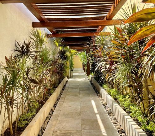 Outdoor corridor to spa treatment rooms at the Remede Spa