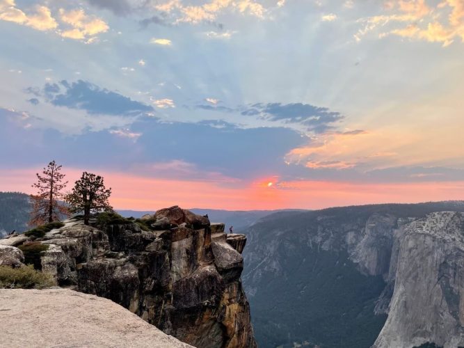 sunset view of taft point Woman at Taft Point at Yosemite National Park at Night